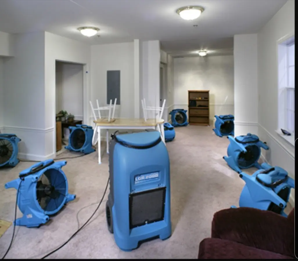 Air movers and dehumidifier setup for Water Damage Restoration in Wynne
